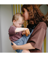 Child secured in the baby carrier and ready to go